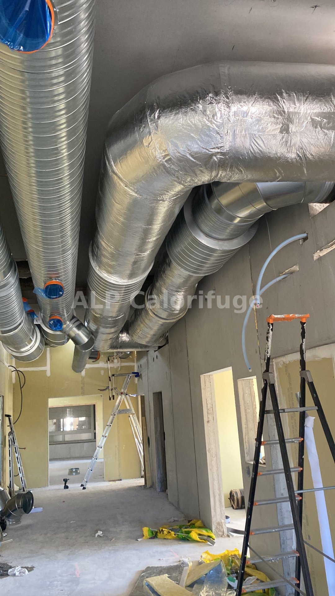 Calorifuge gaines circulaires multiples laine de verre chantier tertiaire